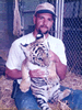 Brian Gisi training tiger cub